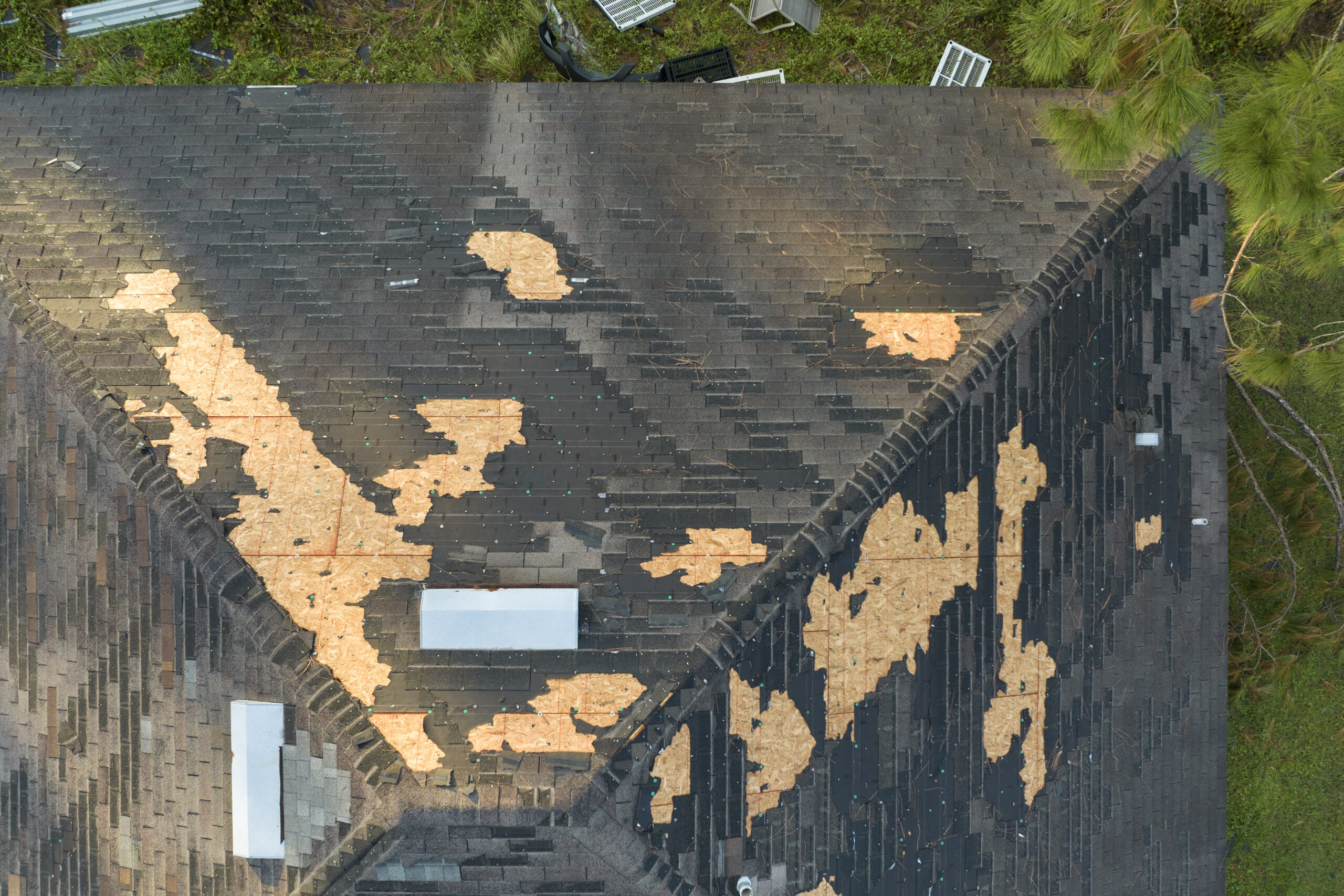 old asphalt shingle roof on home